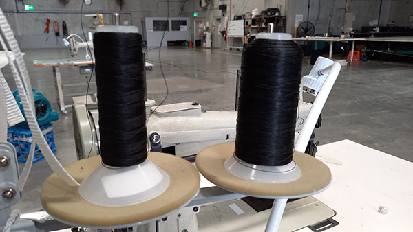 ePTFE thread on a spool in factory